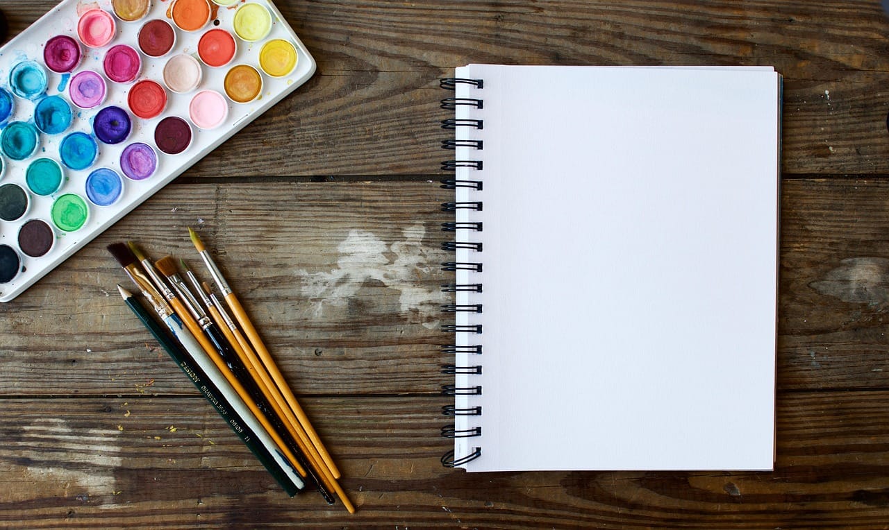 A soft pencil, a rubber, a cheap notebook. That is the whole kit.